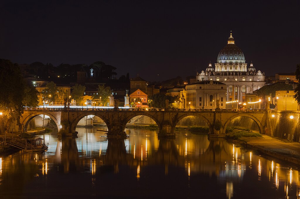 Saint_Peters_Basilica_SantAngelo_bridge_by_night_Rome_Italy.jpg